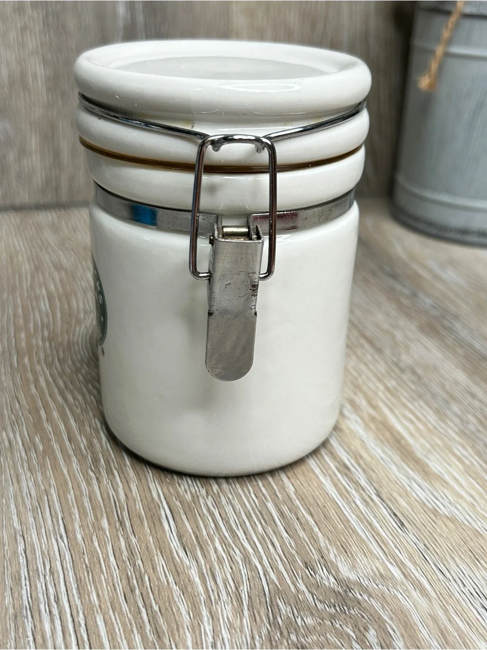 Starbucks White Ceramic Canister with Green Logo and Silver Clasp